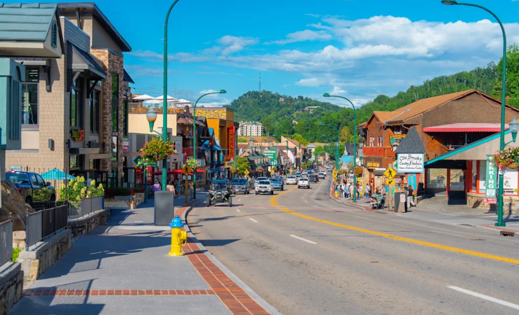 Downtown Gatlinburg surrounded by wooded hills