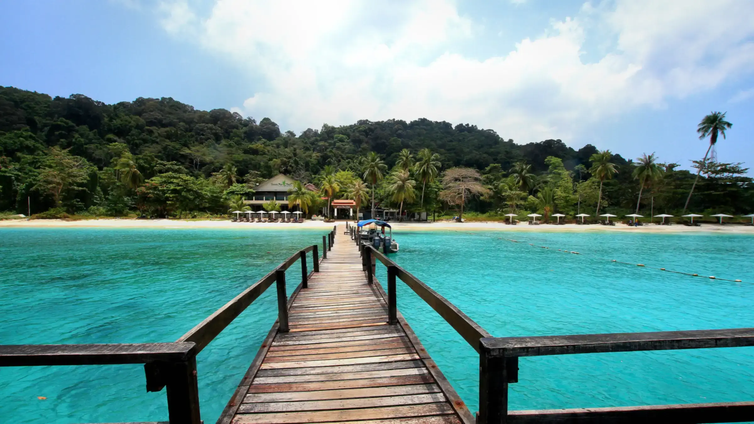 Wooden jetty over turquoise water at Lang Tengah Island, Terengganu